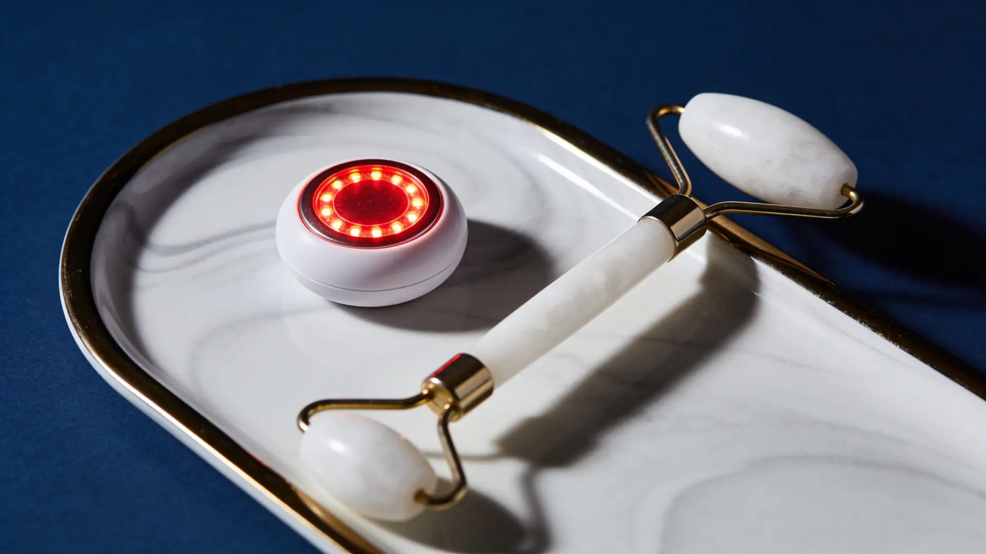 A ceramic roller and LED device on a tray