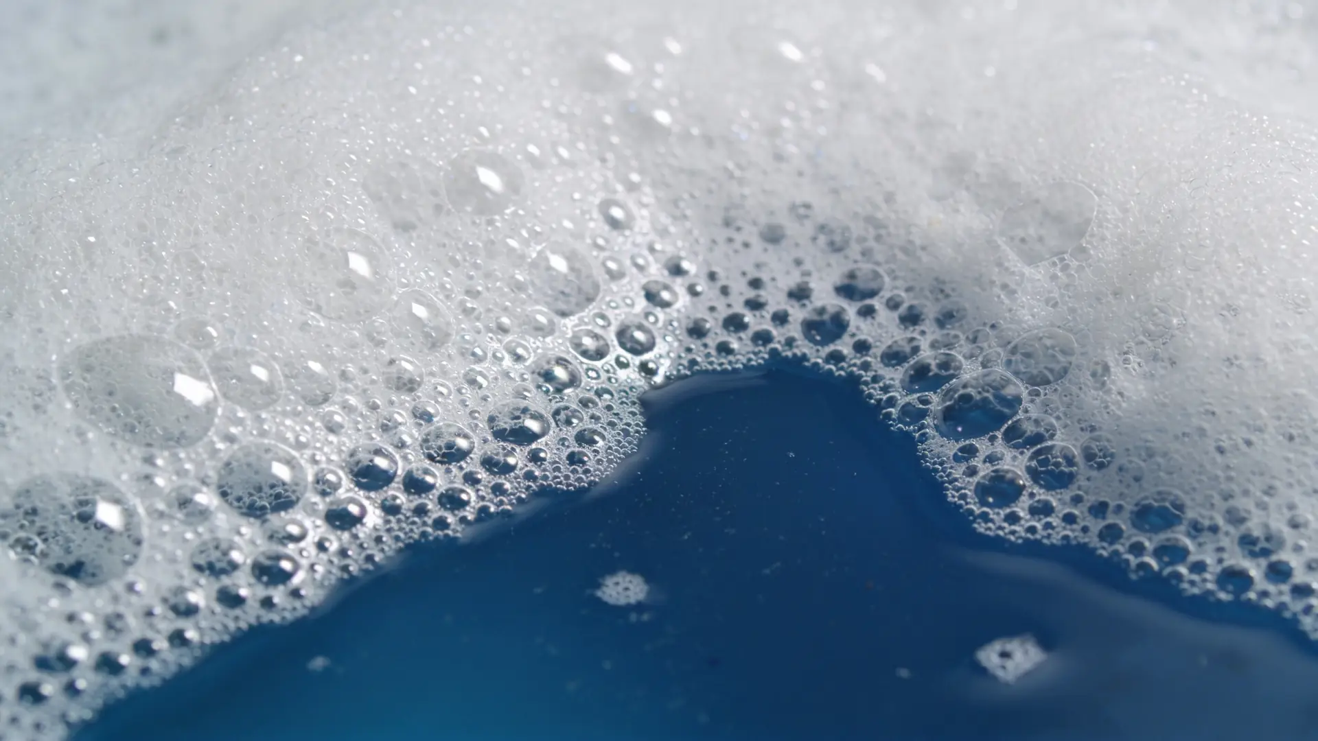 White sea foam on deep blue water — illustrative image for fungal acne